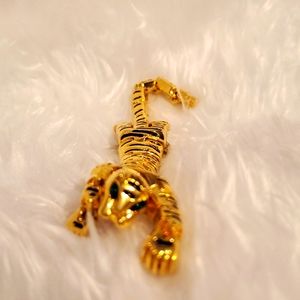 Gold Tone Flexible Tiger Brooch